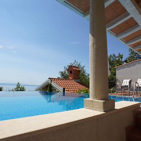 Apartments Villa Krasa Ловран Экстерьер фото